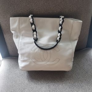 - White black chanel leather black handles a…